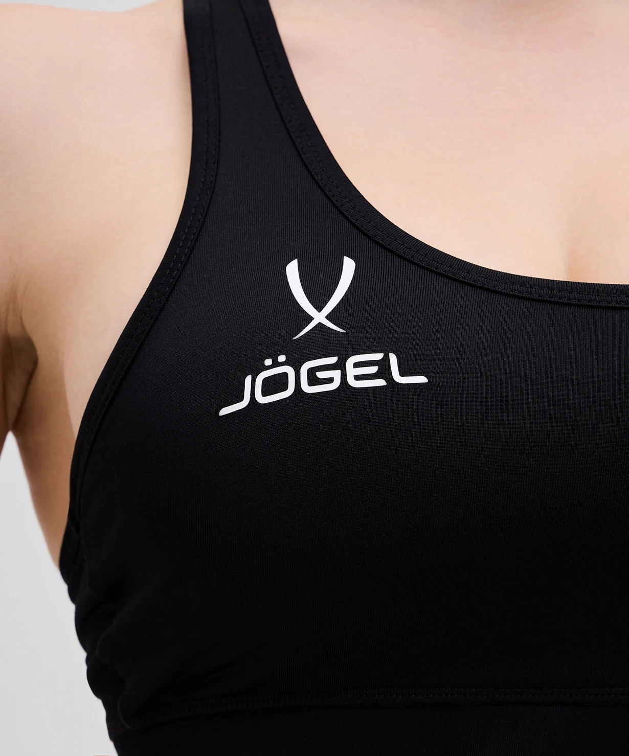  Бра тренировочное JOGEL DIVISION PerFormDRY Womens Top, черный по низким ценам в Томске и Северске