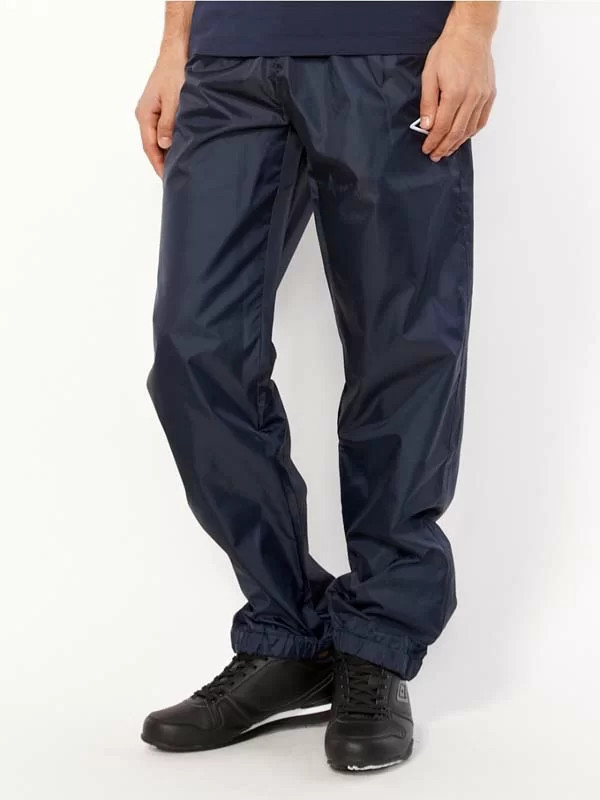 Фото Брюки ветрозащитные Umbro Uniform Training Shower Pants т.син/бел/бел 423013/911 со склада магазина СпортСЕ